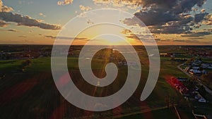 Aerial view of the golden hour looking over Pennsylvania farm lands with barns