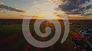 Aerial view of the golden hour looking over Pennsylvania farm lands with barns