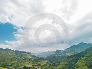 Aerial view of golden rice terraces at Mu cang chai town near Sapa city, north of Vietnam. Beautiful terraced rice field in