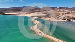 Aerial view of golden sand and crystal sea water on the Canary