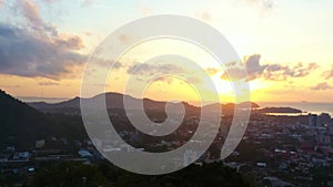 aerial view golden sky at sunrise above the beautiful tower on Khao Rang hill