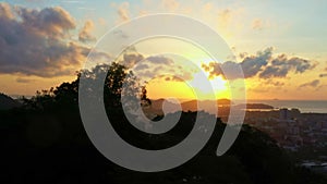 aerial view golden sky at sunrise above the beautiful tower on Khao Rang hill