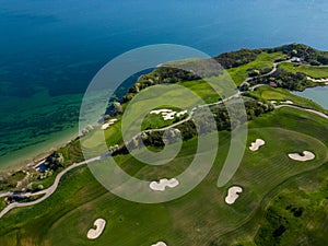 Aerial View of Golf Course Adjacent to Sea