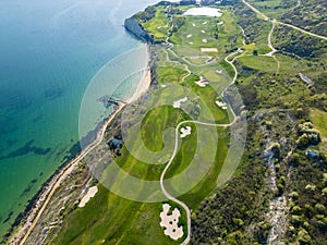Aerial View of Golf Course Adjacent to Sea