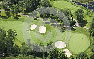 Aerial view of golf course fairway and green