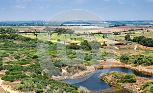 Aerial view on golf course and pond at Arsuf