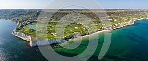 Aerial View of Golf Course by the Sea