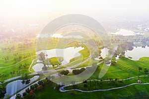 Aerial view of golf field landscape with sunrise view in the morning shot
