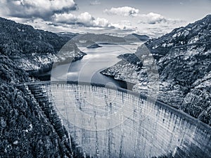 Aerial view of Gordon Dam and lake in black and white. Southwest