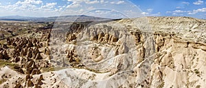 Aerial view of Goreme National Park, Goreme Tarihi Milli Parki, Turkey. The typical rock formations of Cappadocia photo