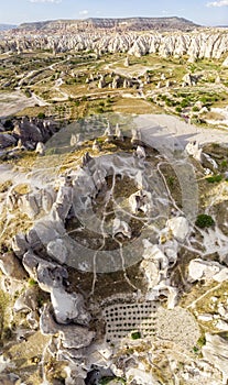 Aerial view of Goreme National Park, Goreme Tarihi Milli Parki, Turkey. The typical rock formations of Cappadocia photo