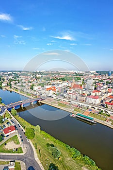 Aerial view of GorzÃÂ³w Wielkopolski portrait format town city at river Warta in Poland