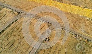 Aerial view Gravel quarrying from the air in a gravel pit