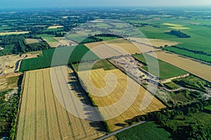 Aerial view Gravel quarrying from the air in a gravel pit