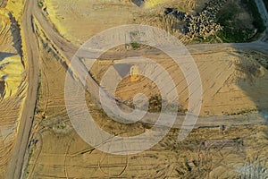 Aerial view Gravel quarrying from the air in a gravel pit