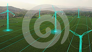 Aerial view of green corn field landscape in countryside with motion graphic wind turbines, concept of generating green energy,