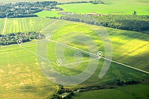 Aerial view of green field, position point and boundary line to show location and area. A tract of land for owned, sale,