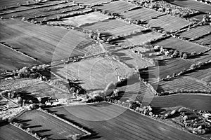 Aerial view of green fields and slopes