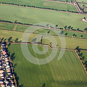 Aerial view of green fields and slopes