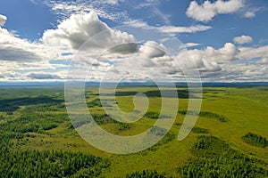 Aerial view of the green forest in the North of Khabarovsk territory, far East, Russia.