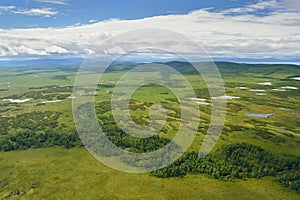 Aerial view of the green forest in the North of Khabarovsk territory, far East, Russia.