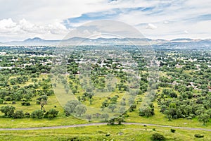 Aerial view of the green lands and mountains, view from the top of Pyramid of the Sun, the largest ruins of the architecturally