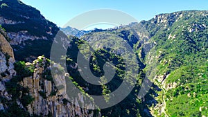 Aerial view of green peak mountain