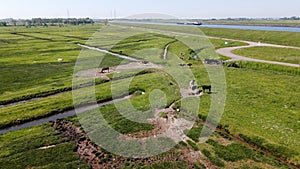 Aerial view on green polders, meadows and water transportion channel in South Beveland, Zeeland, Netherlands photo