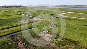 Aerial view on green polders, meadows and water transportion channel in South Beveland, Zeeland, Netherlands photo