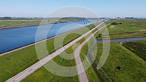 Aerial view on green polders, meadows and water transportion channel in South Beveland, Zeeland, Netherlands photo