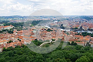 Aerial view of the greenery of Perin Hill and the city of Prague.