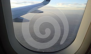 Aerial view of the ground from the window of an airplain in Mexico photo