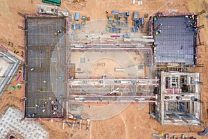 Aerial view of group of construction worker building in construction site.  Civil engineering, industrial development project,