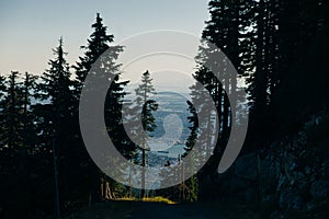 Aerial View of Grouse Mountain with Downtown city. North Vancouver, BC, Canada