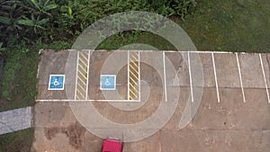 Aerial view of handicapped parking spaces in tourist destinations in Thailand. Parking with a special place for the disabled
