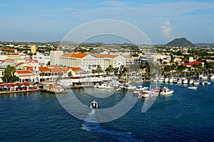 Aerial view of the harbor, boats and buildings along the ports near Oranjestad, Aruba