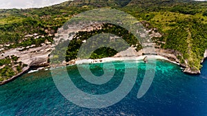 Aerial view on hardly accessible deserted beach. photo