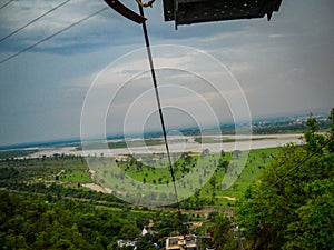 Aerial view of Haridwar town from a cable car. View from cable trolley in Haridwar India photo