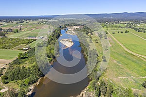 Aerial view of the Hawkesbury River and farmland in regional New South Wales in Australia