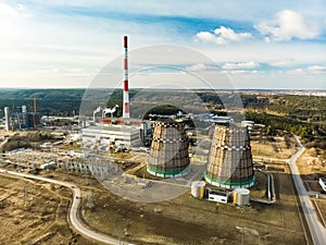 Aerial view of heating plant and thermal power station. Combined modern power station for city district heating. Industrial zone,