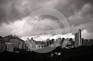 Aerial view of heavy clouds and hong kong skyline