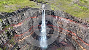 Aerial view of Hengifoss waterfall, Epic Drone Shot Mountain Waterfall.