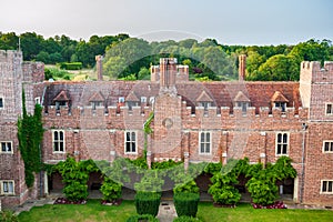 Aerial view of Herstmonceux garden, East Sussex, England. Brick Herstmonceux castle in England East Sussex 15th century. View of