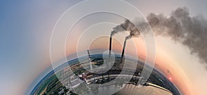 Aerial view from high altitude of little planet earth with coal power plant high pipes with black smokestack polluting