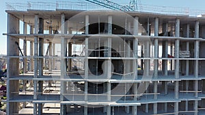 Aerial view of high residential apartment building under construction