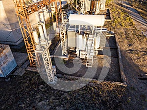 Aerial view of a high voltage power distribution substation. Electricity power substation plant. Transformer