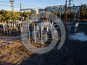 Aerial view of a high voltage power distribution substation. Electricity power substation plant. Transformer