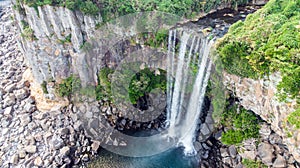 Aerial View of The High Waterfall Jeongbang and Lagoon on Jeju Island