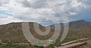 Aerial view highway across the arid desert Arizona mountains adventure traveling desert