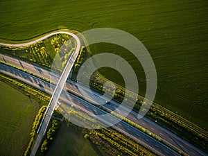 Aerial view of a highway amid fields